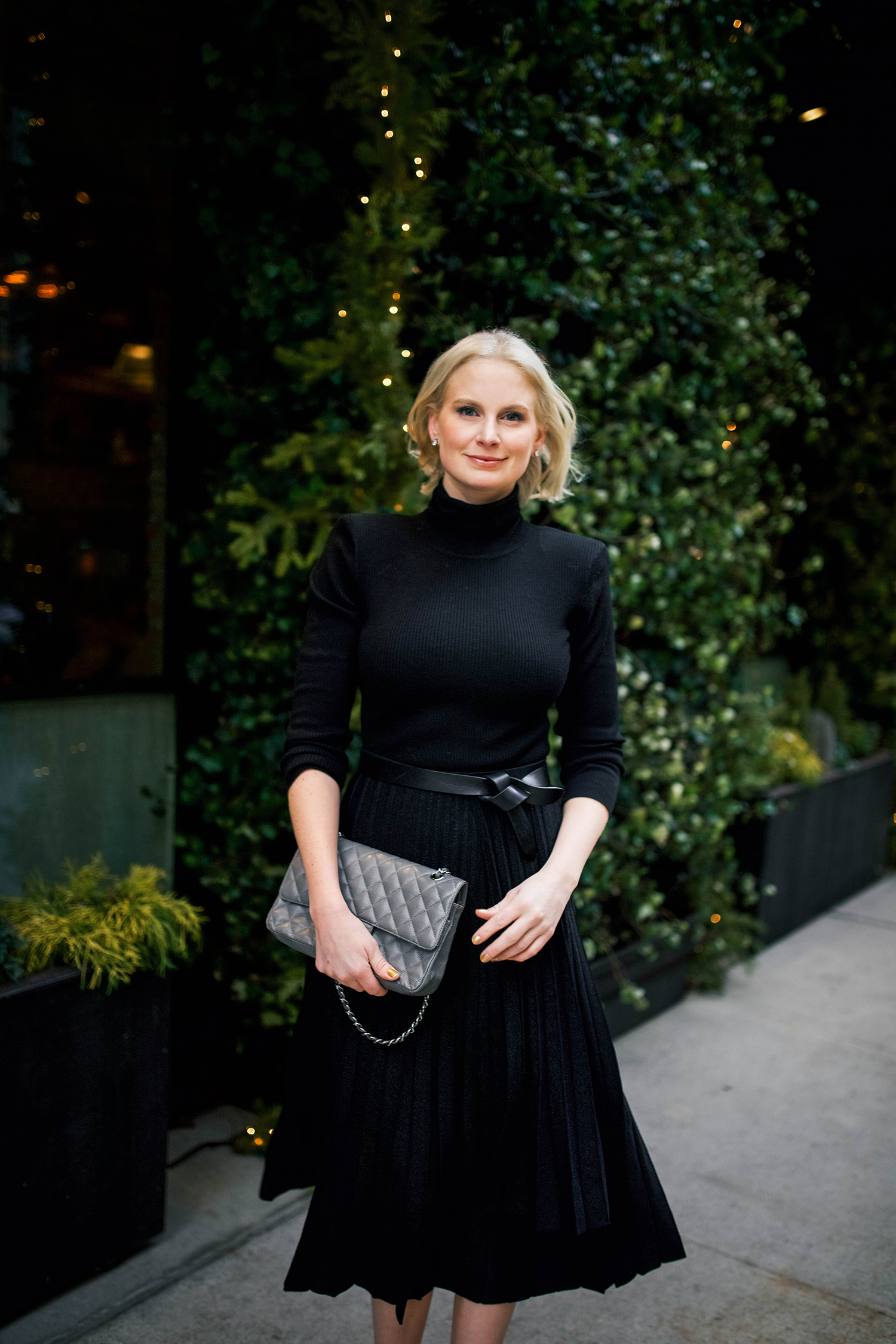 Merritt Beck, Dallas Style Blogger in Black Pleated Midi Skirt
